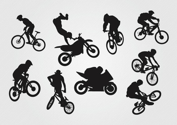 骑山地自行车和越野摩托车的剪影