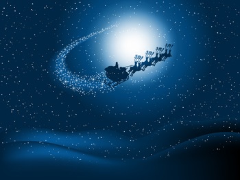 圣诞节平安夜里夜空中奔波的圣诞老人