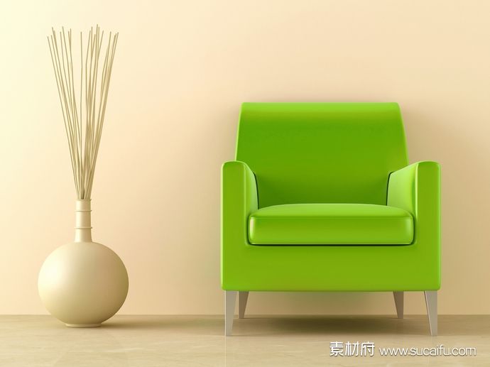 绿色的单人沙发和花瓶装饰